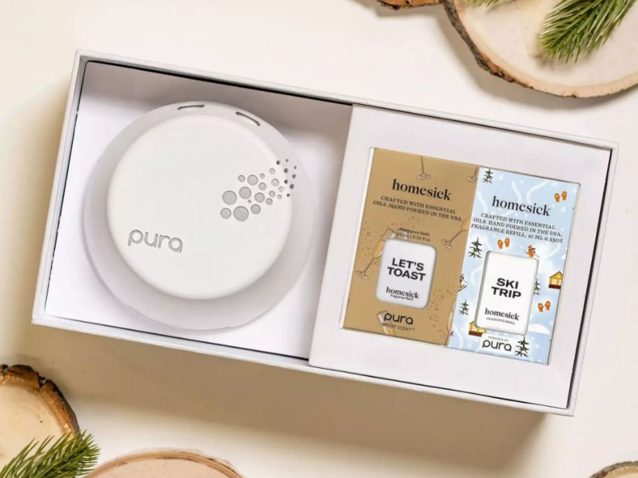 Pura 3 Smart Fragrance Diffuser Set box on table