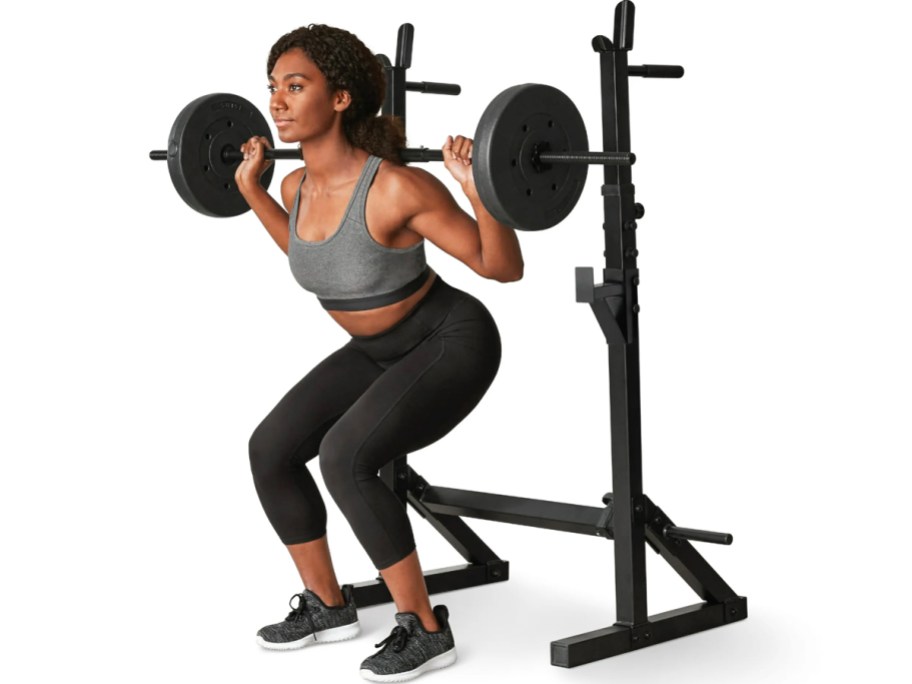 woman using squat bench