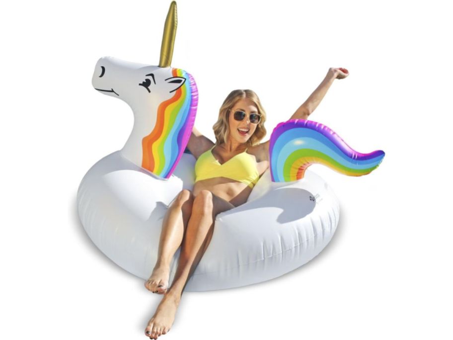 woman on inflatable unicorn float