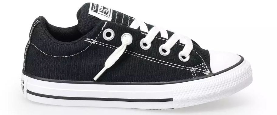 A kid's Converse sneaker in black and white