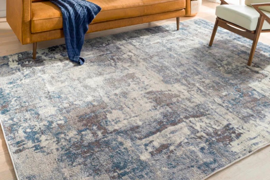 close up of blue and gray abstract rug