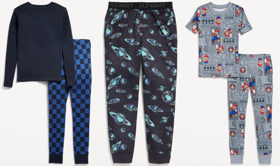 two sets of boys pajamas and a pair of pajama pants