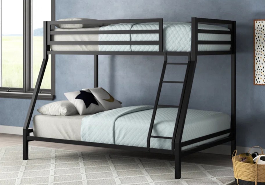 twin bunk bed in kids room with gray blue walls and bedding