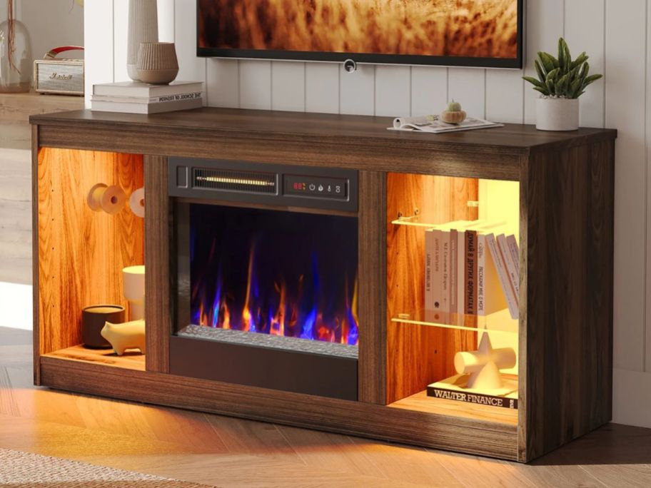 an electric fireplace TV Stand w LED & glass shelves 