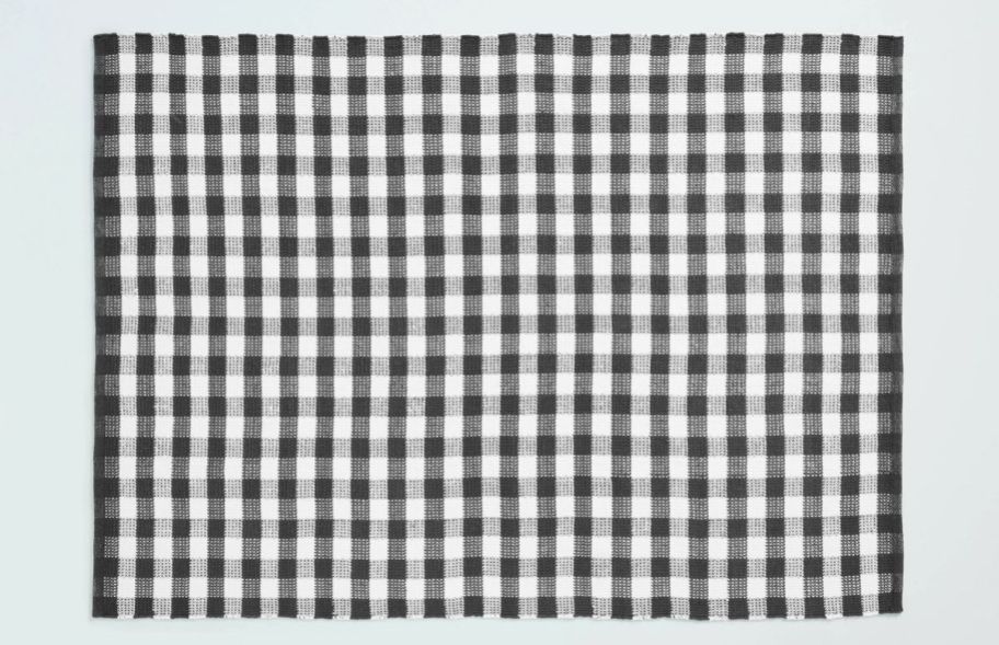 a gray and white gingham area rug