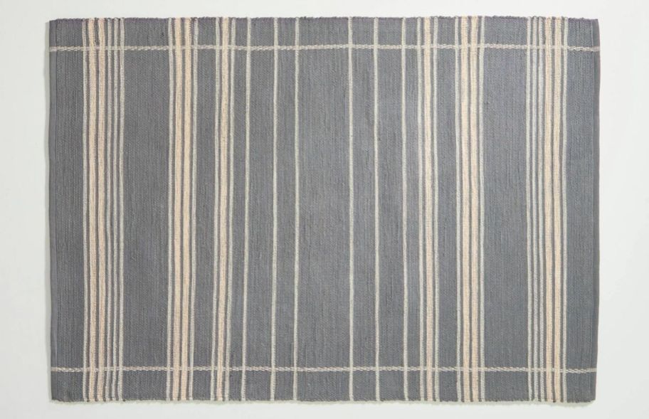 a gray and beige striped area rug